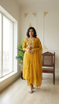 Women Yellow Embodiered Cotton Kurta Pant Dupatta Set
